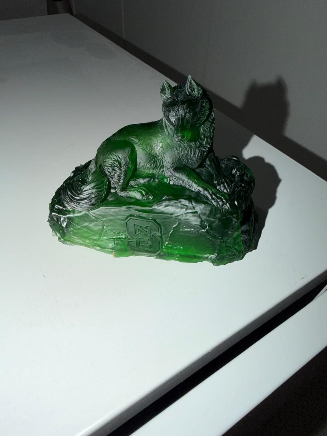 Translucent green resin wolf sculpture
